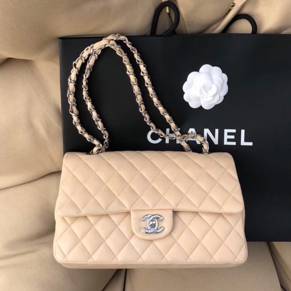CHANEL Handbags - Chanel medium beige classic bag.LAST PRICE